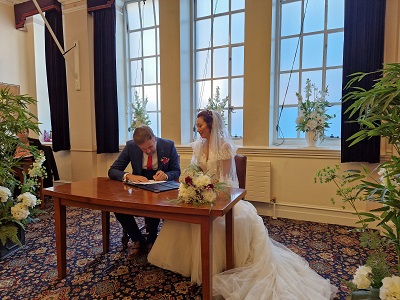 a couple in the Guildhall  reigister office room