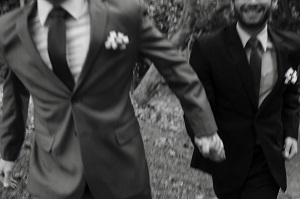 a picture of two men holding hands